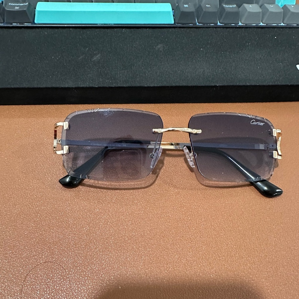 Cartier men’s Blue and Gold Sunglasses